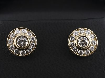 18kt Yellow Gold Rub over and Channel Set Diamond Stud Earrings, Round Brilliant Diamonds 2 x 0.20ct and 0.66ct in Surround