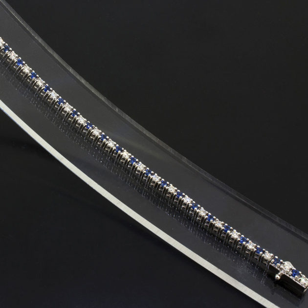 18kt White Gold Tennis Bracelet with Round Brilliant Cut Diamonds 1.00ct Total and Round Brilliant Cut Sapphires 1.19ct Total.