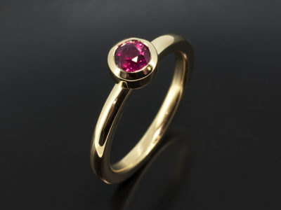 18kt Yellow Gold Rub over Set Design Ladies Ring, Round Ruby, 0.54ct