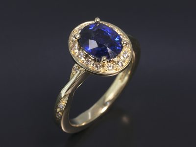 Ladies Sapphire and Diamond Halo Engagement Ring, 18kt Yellow Gold Claw and Pavé Set Design with Twist Shoulder Detail, Oval Sapphire 1.56ct, Round Brilliant Cut Diamond Halo and Shoulder 0.12ct (20)