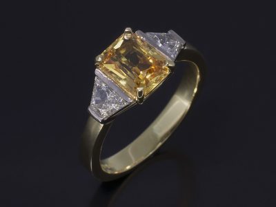 Ladies Sapphire and Diamond Trilogy Engagement Ring, 18kt Yellow and White Gold Claw and Half Rub over Set Design, Radiant Cut Yellow Sapphire Centre Stone 1.82ct, Step Cut Trapezium Diamond Side Stones 0.55ct (2)