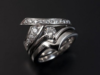 Fitted Eternity and Wedding Ring. 18kt White Gold with Pave Set Round Brilliant Diamonds.