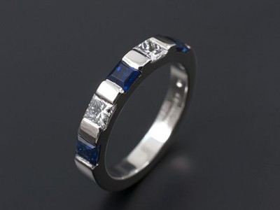 Ladies Wedding / Eternity Ring Comprising 2 x 0.10ct F VS Princess Cut Diamonds and 3 x 3mm Square Ceylonese Sapphires. Hand Made and Bar Set in Palladium.