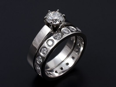 Round Brilliant 0.81ct E VS2 EXEXEX with Full Secret Set Diamond Wedding Ring all Hand Made in Platinum.