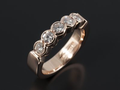 Eternity Ring with Round Brilliant Diamonds 0.57ct Total F VS in a 9kt Rose Gold Half Rub Over Set Design.