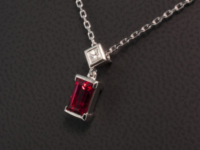 9kt White Gold Part and Full Rub over Set Sapphire and Diamond Drop Pendant, Baguette Cut Blood Orange Sapphire 1.70ct with a Princess Cut Diamond 0.13ct F VS, Diamond Set Bale Detail on Trace Chain