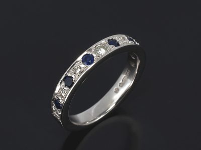 Platinum Round Brilliant Cut Diamond 0.07ct, 0.14ct (6) and Round Brilliant Cut Sapphire 0.54ct (6) Pavé Set Design