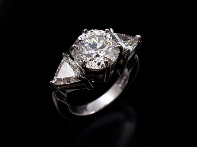 Antique 3.47ct pre 1920's Round Brilliant Diamond with 2 x 0.60ct Trilliant Cuts Hand Made in a Platinum Trilogy Setting