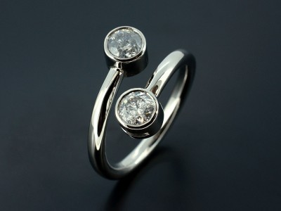 Round Brilliant 0.65ct total F Colour VS Clarity in a Binary Palladium Twist Design.