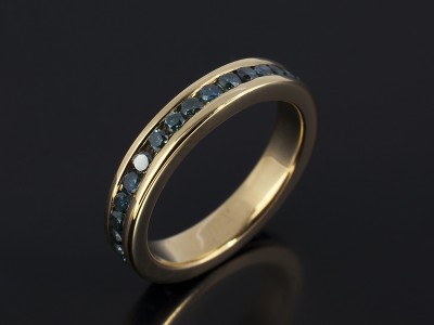 Round Brilliant Blue Diamond Full Channel Set Eternity Ring in 9kt Yellow Gold.