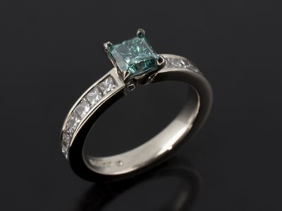 Ladies Blue Diamond Engagement Ring, Platinum Claw and Channel Set Design, Princess Cut Blue Diamond Centre Stone 1.05ct, Princess Cut Diamond 1.68ct (28) Shoulders