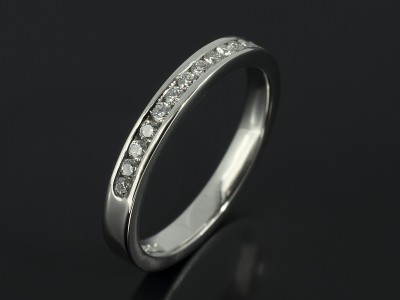 Round Brilliant Diamond Channel Set Platinum Wedding Ring.