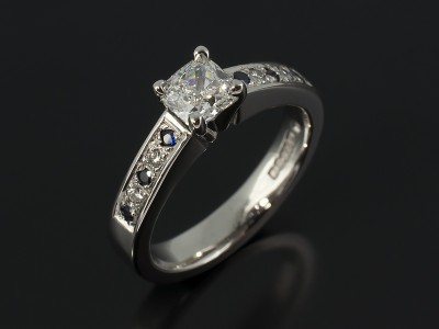 Ladies Diamond and Sapphire Engagement Ring, Palladium 4 Claw Set Design, Cushion Cut 0.60ct, E Colour, VS2 Clarity, Pave Set Sapphire and Diamond Shoulders