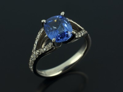 Cushion Cut Sapphire 1.71ct in a Palladium Pavé Set Twist Design.