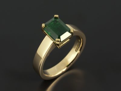 Colombian Emerald 1.89ct in a 4 claw 18kt Yellow Gold Contemporary Solitaire Design.