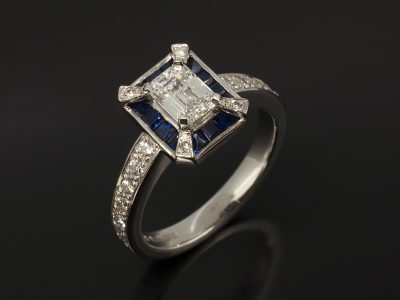 Ladies Diamond and Blue Sapphire Halo Engagement Ring, Platinum 4 Claw, Pavé and Channel Set Design, Emerald Cut Diamond Centre Stone 0.79ct, D Colour, VS1 Clarity, Channel Set Step Cut Sapphire Halo and Pavé Set with Round Brilliant Cut Diamonds 0.30ct (18)