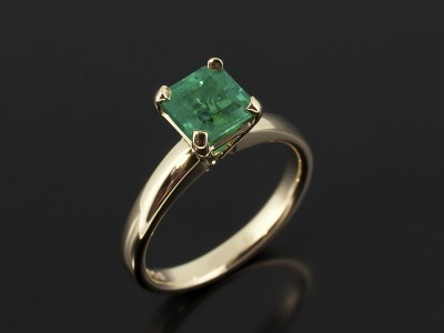 Asscher Cut Emerald 0.89ct in a 9kt Yellow Gold 4 Claw Solitaire Design with Tapered Basket Setting