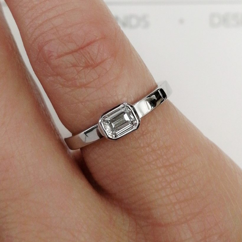 Emerald Cut Diamond 0.35ct F VS in a 18kt White Gold Rub Over Set Design Engagement Ring