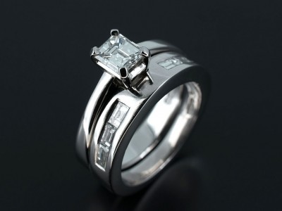 Emerald Cut 0.58ct E Colour VS2 Clarity in Platinum with Fitted Baguette Cut Channel Set Wedding Ring.