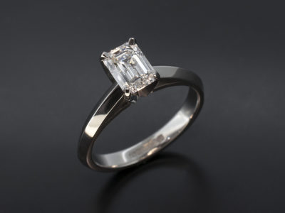 Ladies Solitaire Diamond Engagement Ring, Platinum 4 Claw Design with Knife Edged Split Shoulder Band Detail, Emerald Cut Diamond 0.93ct, E Colour, VS1 Clarity