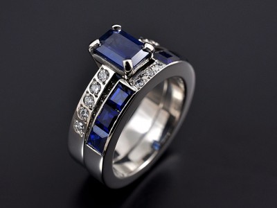 Emerald Cut Sapphire 1.34ct with Pave Set Diamond Shoulders and Fitted Sapphire Channel Set Wedding Ring. Both Hand Made in Palladium