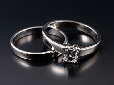 Emerald Cut 0.58ct E Colour VS1 Clarity in a 4 Claw Platinum Setting with Fitted Wedding Ring