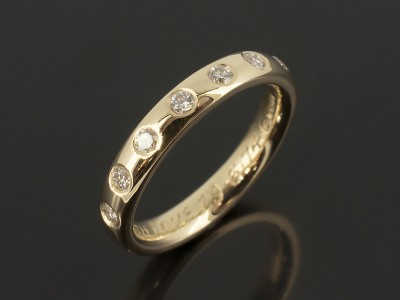 Eternity Ring 18kt Yellow Gold with Secret Set Round Brilliant Diamonds.