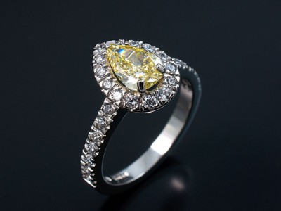 Ladies Yellow Diamond Halo Engagement Ring, Platinum Claw and Pavé Set Design, Pear Cut Intense Yellow Diamond 0.74ct, VS1 Clarity, Round Brilliant Cut Diamond Halo and Shoulder