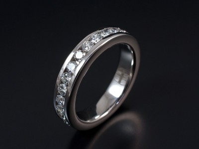 Round Brilliant Cut Full Channel Set Eternity / Wedding Ring in 9kt White Gold.