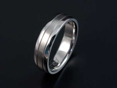 Gents Platinum Wedding Ring with 2 Grooved Lines.