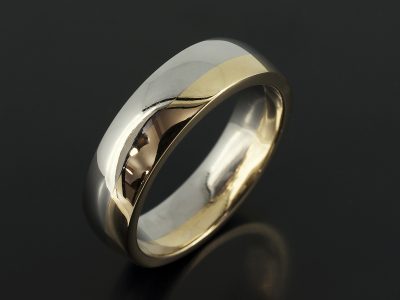 Gents Two tone 18kt Yellow and White Gold Polished 6mm Court Shaped Design.