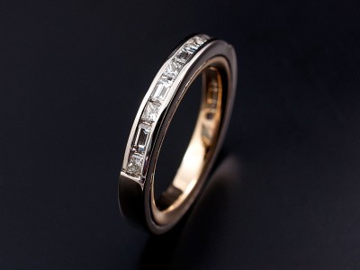 Princess Cut and Baguette Cut Channel Set White Gold Eternity Ring with Yellow Gold Inner Sleeve