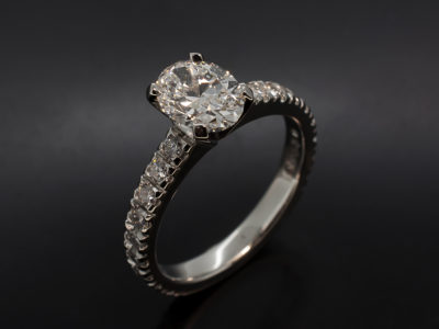 Ladies Diamond Engagement Ring, Platinum Claw and Castle Set Design, Oval Cut 1.00ct, E Colour, EXEX, Round Brilliant Cut Diamond Shoulders