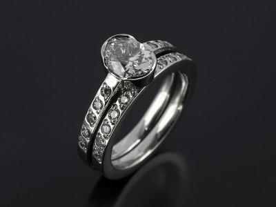 Oval Cut 1.01ct D VS2 with Fitted Platinum Bead Set Wedding Ring.