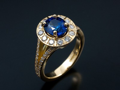 Oval 2.01ct Ceylonese Sapphire with Multiple Round Brilliants Pave Set into Halo and Split Shoulders in 18kt Yellow Gold