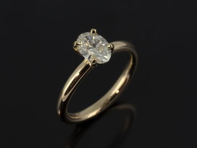 Ladies Solitaire Diamond Engagement Ring, 14kt Yellow Gold 4 Claw Set Design, Oval Cut Diamond 0.61ct, F Colour, SI1 Clarity