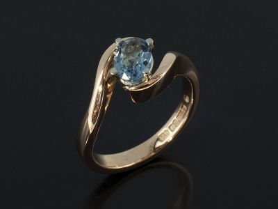 Ladies Aquamarine Solitaire Dress Ring, 18kt Rose Gold 4 Claw Set Twist Design, Oval Cut Aquamarine 0.60ct