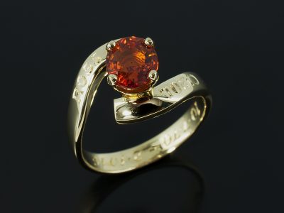 Oval Blood Orange Sapphire 1.65ct in an 18kt Yellow Gold 4 Claw Twist.