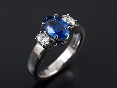 Oval Ceylonese Sapphire 1.74ct with 2 x 0.31ct F VS Oval Cut Diamonds in a Palladium Setting