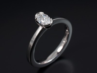 Ladies Solitaire Diamond Engagement Ring, Platinum Tension Set Design, Oval Cut Diamond 0.47ct, E Colour, VS1 Clarity