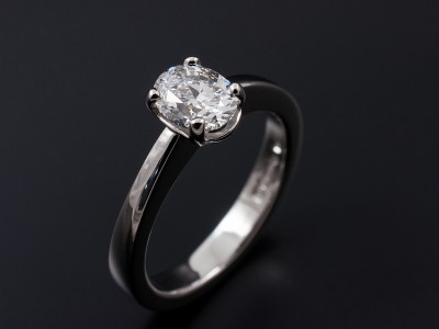 Ladies Solitaire Diamond Engagement Ring, Platinum 4 Claw Set Design, Oval Cut Diamond 0.91ct, E Colour, VS2 Clarity