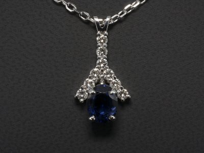 18kt White Gold Claw Set Sapphire and Diamond Drop Pendant, Oval Cut Sapphire, 3.50ct and Round Brilliant Cut Diamonds 0.56ct (9), F Colour, SI1 Clarity, Split Bale Detail on Trace Chain