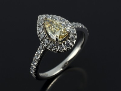 Ladies Yellow Diamond Halo Engagement Ring, Palladium Claw and Pavé Set Design, Fancy Yellow Pear Cut Diamond Centre Stone 0.65ct, Round Brilliant Cut Diamond Halo and Shoulder