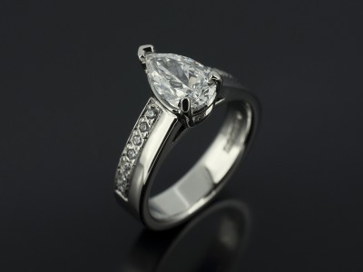 Ladies Diamond Engagement Ring, Palladium Claw and Pavé Set Design, Pear Cut Diamond Centre Stone 0.92ct, D Colour, VS2 Clarity, Round Brilliant Cut Diamond Set Band