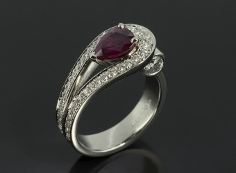 Pear Cut Ruby 1.18ct in a Platinum Pavé Diamond Set Double Band with 2 x 0.20ct F VS Round Brilliant Diamonds.