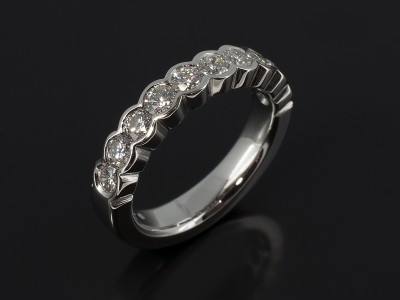 Platinum Eternity Ring with 10 x Round Brilliant Diamonds F VS Quality 1.30ct Total in a Half Rub Over Set Design.
