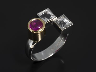 Cabochon Cut Ruby 0.76ct and Step Cut White Sapphire 1.45ct (2) Rub over Set in 18kt Yellow Gold and Platinum in a Dress Ring Design