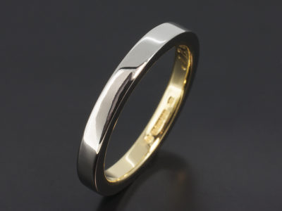 Platinum and 18kt Yellow Gold Two Tone Inner Sleeve Design Wedding Ring.