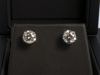 Platinum 4 Claw Set Diamond Stud Earrings, Round Brilliant Cut Diamonds. 2 x 1.21ct E Colour SI2 Clarity Triple Excellent Grade with Locking Fittings