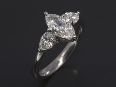 Ladies Trilogy Diamond Engagement Ring, Platinum Claw Set Design, Marquise Cut Diamond Centre Stone 0.72ct, E Colour, SI2 Clarity, Pear Cut Diamond Side Stones 0.48ct (Total)